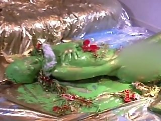 Girl being turned to Christmas decoration